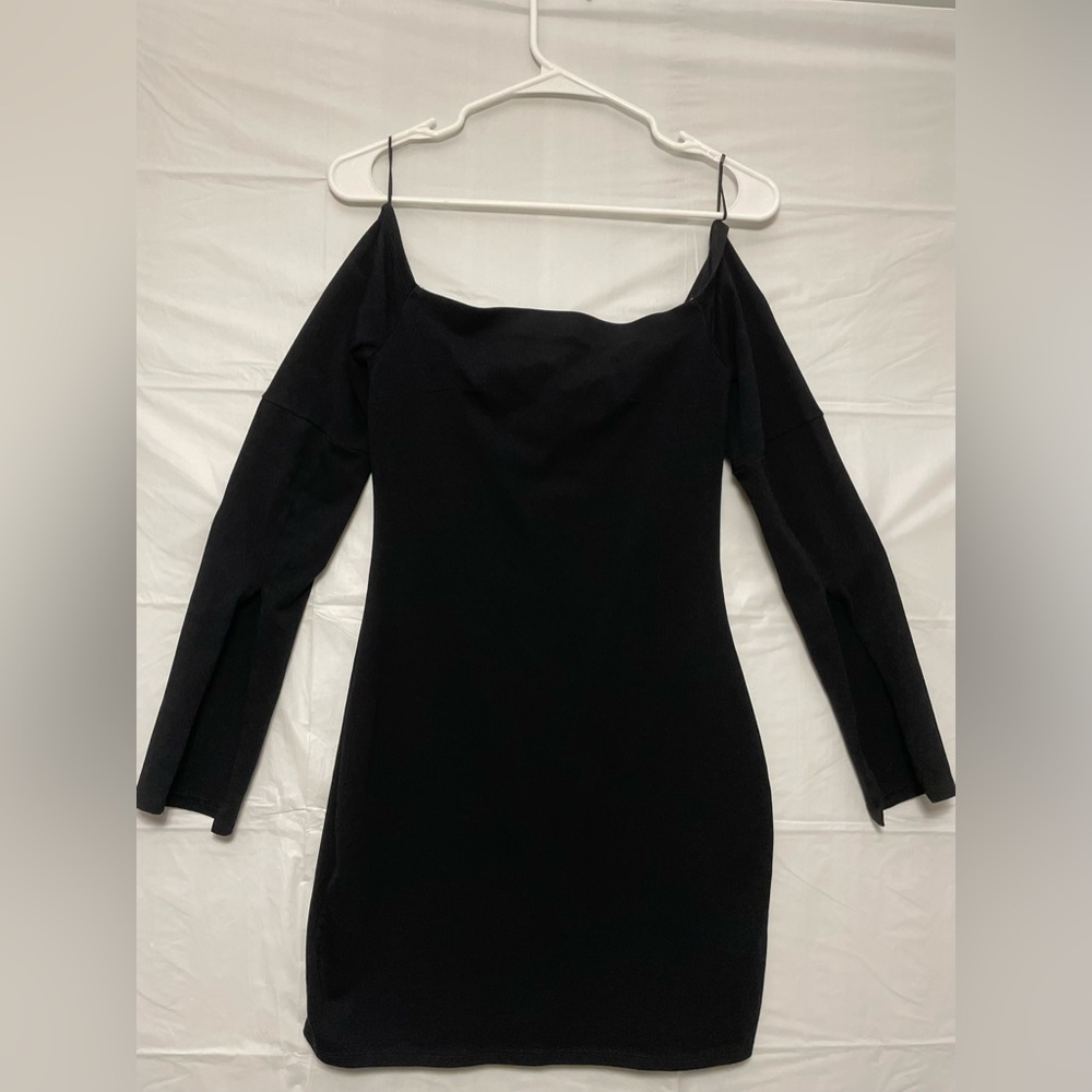 Express Off-Shoulder Bodycon Mini Dress with Split in the Sleeves.